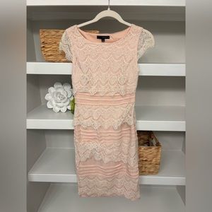Knee length dress. Tight. Pink with white lace. Size 4. Cap sleeves. Worn once.